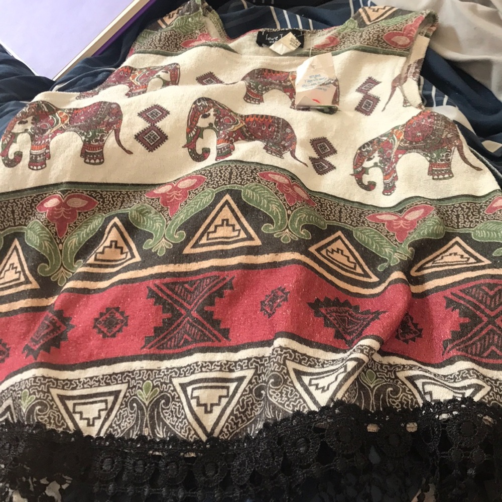 A elephant shirt from rainbow clothing store